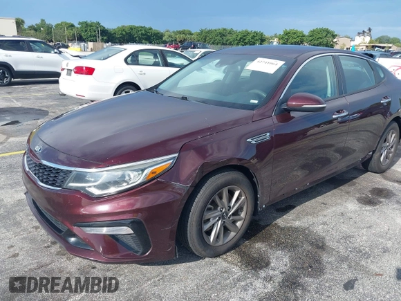 2020 Kia Optima LX with VIN 5XXGT4L37LG388611, listed as a IAAI auction lot 42741064 with 104,409 mi miles and . Bid and sale history available at DreamBid. Image 6.
