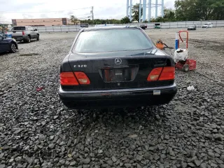 1999 Mercedes-Benz E-Class with VIN WDBJF65H4XA883351, listed as a Copart auction lot 73682964 with 156,446 mi miles and Salvage Title. Bid and sale history available at carsss.com. Image 6.