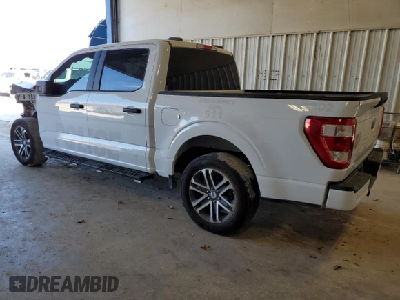 2023 Ford F-150 XL with VIN 1FTEW1CP2PKD69265, listed as a Copart auction lot 44341405 with 15,368 mi miles and Salvage Title. Bid and sale history available at DreamBid. Image 2.