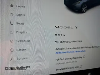2024 Tesla Model Y with VIN 7SAYGDED4RF017614, listed as a Copart auction lot 45754675 with 11,209 mi miles and Salvage title. Bid and sale history available at DreamBid. Image 13.