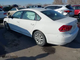 2015 Volkswagen Passat 1.8T S with VIN 1VWAT7A30FC020122, listed as a IAAI auction lot 41449481 with 129,650 mi miles. Bid and sale history available at carsss.com. Image 3.