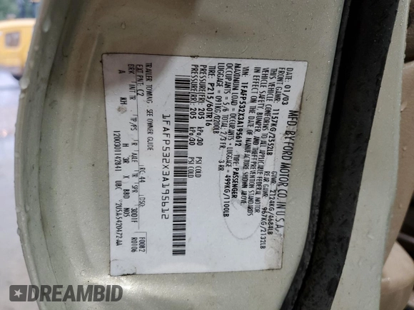 2003 Ford Taurus SE Standard z VIN 1FAFP532X3A195612, wystawiony jako Copart lot #54016645 z przebiegiem 143 168 mil mil oraz Szkoda całkowita • Salvage title. Historia ofert i sprzedaży dostępna na DreamBid. Obrazek 12.