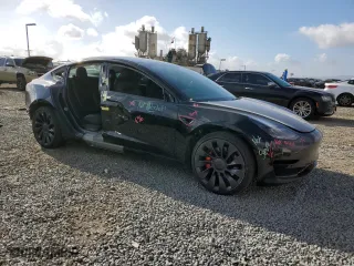 2022 Tesla Model 3 Performance with VIN 5YJ3E1EC9NF130911, listed as a Copart auction lot 50942735 with 30,484 mi miles and Salvage Title. Bid and sale history available at carsss.com. Image 4.