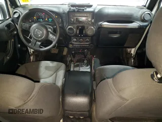 2015 Jeep Wrangler Unlimited Sport with VIN 1C4BJWDG0FL737965, listed as a Copart auction lot 56711765 with 149,528 mi miles and Salvage title. Bid and sale history available at DreamBid. Image 8.