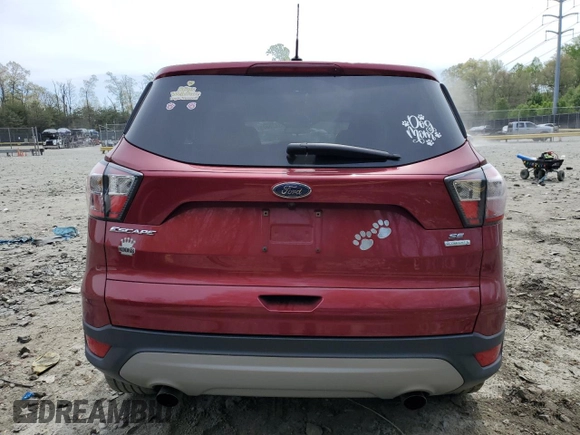 2017 Ford Escape SE with VIN 1FMCU0GD4HUA10282, listed as a Copart auction lot 53872825 with 102,832 mi miles and Salvage Title. Bid and sale history available at DreamBid. Image 6.