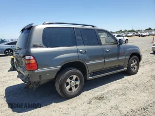 2001 Toyota Land Cruiser z VIN JTEHT05JX12015523, wystawiony jako Copart lot #57561425 z przebiegiem 277 413 mil mil oraz Szkoda całkowita • Salvage title. Historia ofert i sprzedaży dostępna na DreamBid. Obrazek 3.