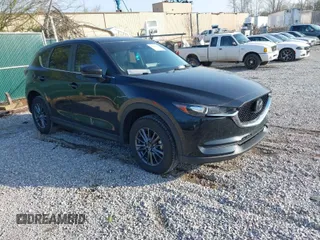 2021 Mazda CX-5 Touring with VIN JM3KFACM5M1313631, listed as a IAAI auction lot 41928912 with 41,448 mi miles. Bid and sale history available at carsss.com. Image 1.
