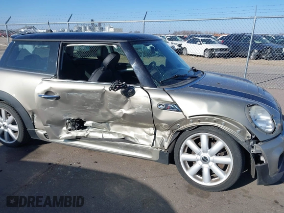 2007 MINI Hardtop S with VIN WMWMF73567TL91385, listed as a IAAI auction lot 41866865 with 114,778 mi miles and . Bid and sale history available at DreamBid. Image 6.