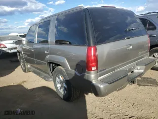 2000 Cadillac Escalade with VIN 1GYEK63R3YR218500, listed as a Copart auction lot 77676354 with 164,602 mi miles and Clean Title. Bid and sale history available at carsss.com. Image 2.