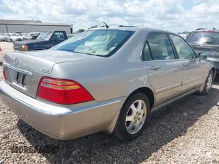 2002 Acura RL with VIN JH4KA96532C009398, listed as a IAAI auction lot 42688367 with 123,971 mi miles and . Bid and sale history available at DreamBid. Image 4.