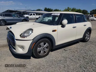 2016 MINI Hardtop 4 Door with VIN WMWXU1C57G2D10886, listed as a Copart auction lot 62867725 with 107,954 mi miles and Salvage title. Bid and sale history available at DreamBid. Image 1.
