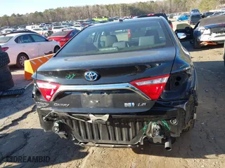2015 Toyota Camry Hybrid LE with VIN 4T1BD1FK7FU167027, listed as a IAAI auction lot 41697235 with 253,152 mi miles. Bid and sale history available at carsss.com. Image 16.