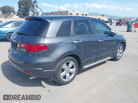 2007 Acura RDX Tech Pkg with VIN 5J8TB18527A802889, listed as a IAAI auction lot 41882486 with 304,605 mi miles. Bid and sale history available at carsss.com. Image 4.