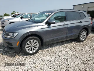 2018 Volkswagen Tiguan S with VIN 3VV0B7AXXJM131760, listed as a Copart auction lot 58831685 with 124,431 mi miles and Salvage title. Bid and sale history available at DreamBid. Image 1.