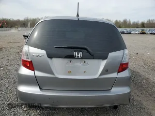 2010 Honda Fit with VIN JHMGE8H20AC010563, listed as a Copart auction lot 53635165 with 135,499 mi miles and Salvage Title. Bid and sale history available at carsss.com. Image 6.