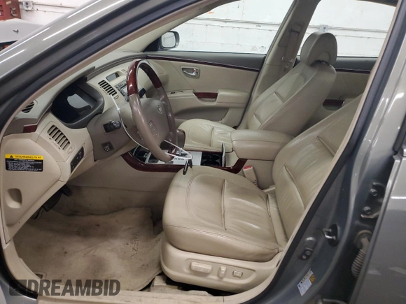 2007 Hyundai Azera SE z VIN KMHFC46FX7A183539, wystawiony jako Copart lot #54205265 z przebiegiem 154 942 mil mil oraz Nie do naprawy • Non repairable. Historia ofert i sprzedaży dostępna na DreamBid. Obrazek 7.
