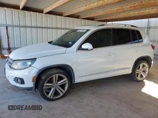 2015 Volkswagen Tiguan R-Line z VIN WVGAV7AXXFW093699, wystawiony jako Copart lot #87955535 z przebiegiem 100 880 mil mil oraz Szkoda całkowita • Salvage title. Historia ofert i sprzedaży dostępna na DreamBid. Obrazek 1.