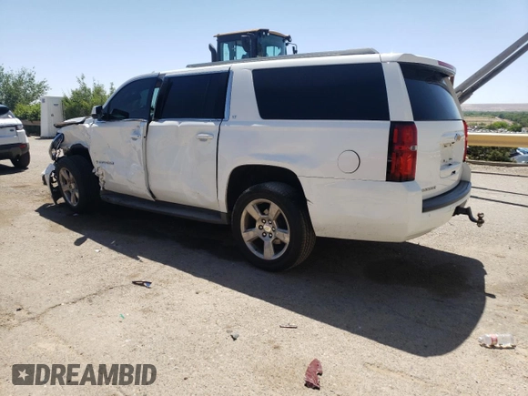 2015 Chevrolet Suburban LT z VIN 1GNSCJKC4FR549967, wystawiony jako Copart lot #57952955 z przebiegiem 311 163 mil mil oraz Szkoda całkowita • Salvage title. Historia ofert i sprzedaży dostępna na DreamBid. Obrazek 2.