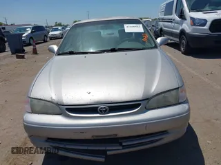 1998 Toyota Corolla VE with VIN 1NXBR18E8WZ105435, listed as a IAAI auction lot 42660562 with 295,050 mi miles and . Bid and sale history available at DreamBid. Image 6.