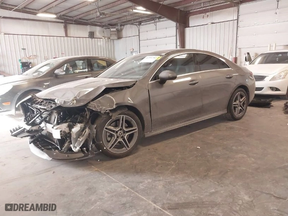 2022 Mercedes-Benz CLA with VIN W1K5J4HB6NN293676, listed as a IAAI auction lot 41394782 with 14,669 mi miles. Bid and sale history available at carsss.com. Image 2.