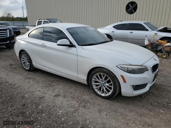 2014 BMW 2 Series 228i with VIN WBA1F5C50EV255830, listed as a Copart auction lot 82403254 with 69,286 mi miles and Salvage Title. Bid and sale history available at carsss.com. Image 4.