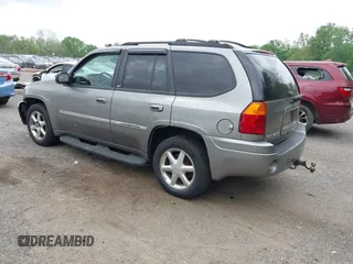 2007 GMC Envoy SLE z VIN 1GKDT13S472253627, wystawiony jako IAAI lot #42292399 z przebiegiem 204 263 mil mil oraz . Historia ofert i sprzedaży dostępna na DreamBid. Obrazek 3.