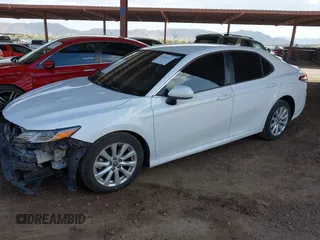 2019 Toyota Camry LE with VIN 4T1B11HK0KU798847, listed as a IAAI auction lot 41944077 with 138,289 mi miles and . Bid and sale history available at DreamBid. Image 2.
