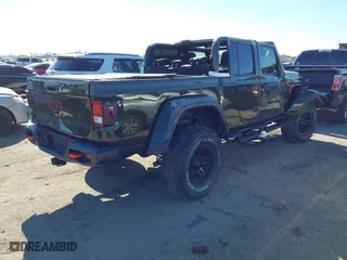 2022 Jeep Gladiator Mojave with VIN 1C6JJTEG5NL110886, listed as a IAAI auction lot 41410576 with 44,307 mi miles. Bid and sale history available at carsss.com. Image 4.