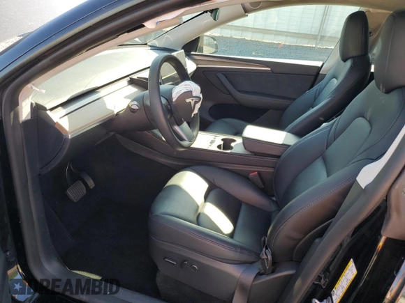 2023 Tesla Model Y Long Range z VIN 7SAYGDEE1PF865195, wystawiony jako Copart lot #57455765 z przebiegiem 32 011 mil mil oraz Szkoda całkowita • Salvage title. Historia ofert i sprzedaży dostępna na DreamBid. Obrazek 7.
