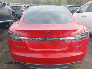 2013 Tesla Model S with VIN 5YJSA1CN1DFP09756, listed as a IAAI auction lot 41921720 with 94,770 mi miles. Bid and sale history available at carsss.com. Image 16.