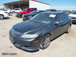 2004 Mazda Mazda6 s with VIN 1YVFP80D645N16762, listed as a IAAI auction lot 41854938 with 186,760 mi miles. Bid and sale history available at carsss.com. Image 2.