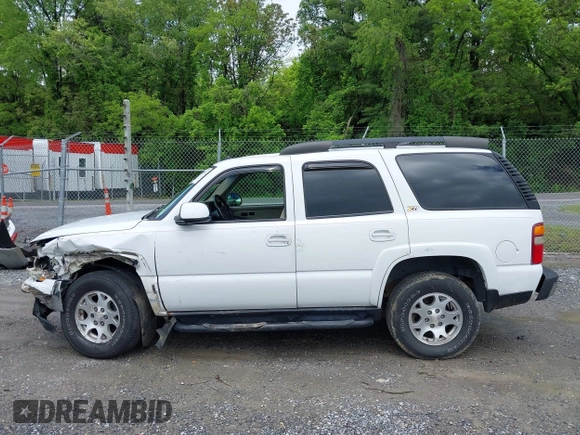 2003 Chevrolet Tahoe Z71 z VIN 1GNEK13Z23R230226, wystawiony jako IAAI lot #42252874 z przebiegiem 251 268 mil mil oraz . Historia ofert i sprzedaży dostępna na DreamBid. Obrazek 14.