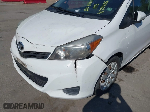 2014 Toyota Yaris L with VIN VNKJTUD35EA011933, listed as a IAAI auction lot 42150303 with 114,369 mi miles. Bid and sale history available at carsss.com. Image 12.