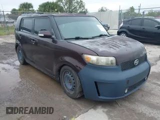 2009 Scion xB with VIN JTLKE50E391087715, listed as a IAAI auction lot 41671033 with 134,638 mi miles. Bid and sale history available at carsss.com. Image 1.