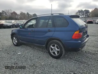 2001 BMW X5 3.0i with VIN WBAFA53521LP22241, listed as a Copart auction lot 79706624 with 145,145 mi miles and Salvage Title. Bid and sale history available at carsss.com. Image 2.