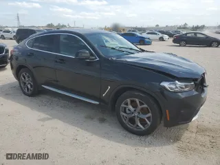 2024 BMW X4 xDrive30i with VIN 5UX33DT03R9U08801, listed as a Copart auction lot 52982635 with 25,238 mi miles and Salvage Title. Bid and sale history available at carsss.com. Image 4.