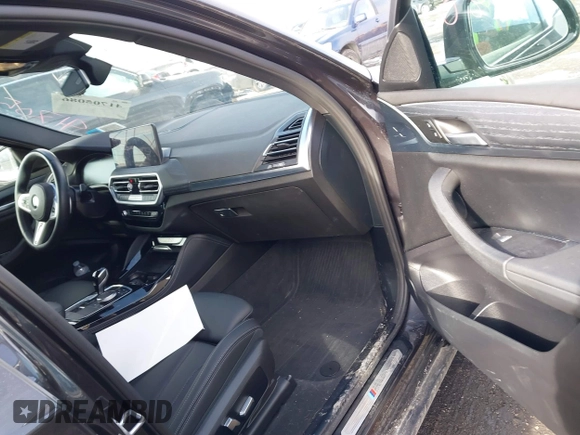 2023 BMW X4 xDrive30i with VIN 5UX33DT08P9S91679, listed as a IAAI auction lot 41705086 with 23,534 mi miles and . Bid and sale history available at DreamBid. Image 5.