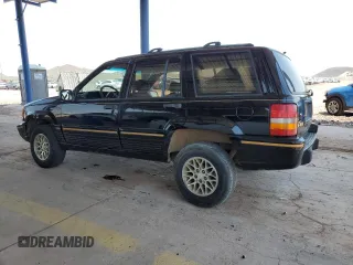 1994 Jeep Grand Cherokee Limited with VIN 1J4GZ78S5RC304501, listed as a Copart auction lot 64632335 with 184,333 mi miles and Salvage title. Bid and sale history available at DreamBid. Image 2.