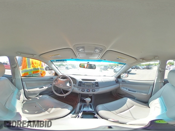 2004 Toyota Camry LE z VIN JTDBE32K640270298, wystawiony jako Copart lot #58800955 z przebiegiem 79 064 mil mil oraz Szkoda całkowita • Salvage title. Historia ofert i sprzedaży dostępna na DreamBid. Obrazek 14.