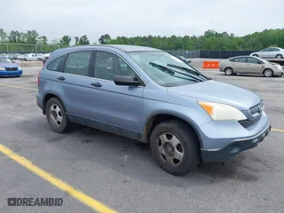 2007 Honda CR-V LX with VIN JHLRE48317C057561, listed as a IAAI auction lot 42119266 with 307,373 mi miles. Bid and sale history available at carsss.com. Image 1.