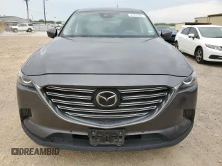 2021 Mazda CX-9 Touring z VIN JM3TCACY1M0502783, wystawiony jako Copart lot #53551935 z przebiegiem 71 373 mil mil oraz Czysty tytuł • Clean title. Historia ofert i sprzedaży dostępna na DreamBid. Obrazek 5.