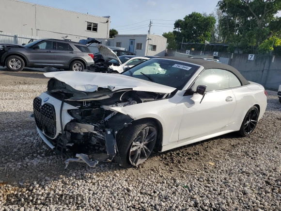 2024 BMW 4 Series M440i with VIN WBA53AT01RCN16715, listed as a Copart auction lot 75427644 with 6,597 mi miles and Salvage Title. Bid and sale history available at carsss.com. Image 1.
