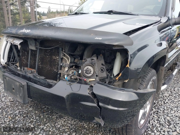 2004 Jeep Grand Cherokee Limited with VIN 1J8GW58N04C186548, listed as a IAAI auction lot 41949015 with 244,505 mi miles. Bid and sale history available at carsss.com. Image 6.