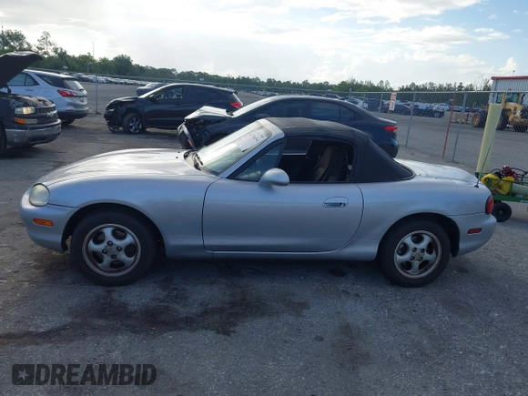 1999 Mazda MX-5 Miata with VIN JM1NB3534X0124237, listed as a IAAI auction lot 42536654 with 92,696 mi miles and . Bid and sale history available at DreamBid. Image 15.