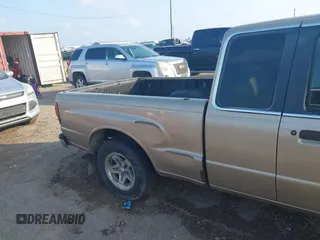 1999 Mazda B-Series 2WD Truck SE with VIN 4F4YR16V0XTM00755, listed as a IAAI auction lot 41530106 with 195,924 mi miles. Bid and sale history available at carsss.com. Image 6.