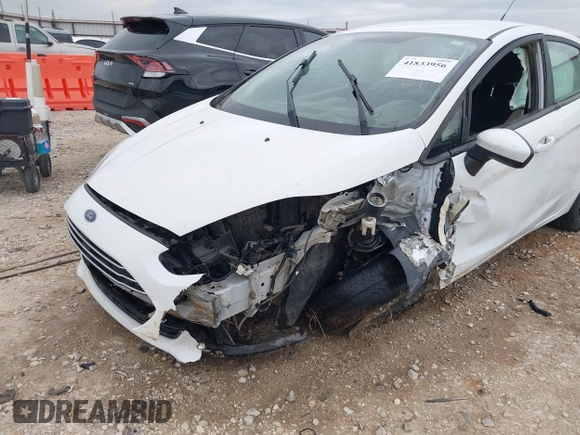 2018 Ford Fiesta S with VIN 3FADP4AJ8JM124873, listed as a IAAI auction lot 41833956 with 86,759 mi miles and . Bid and sale history available at DreamBid. Image 6.