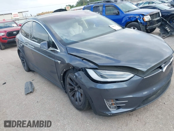 2018 Tesla Model X 75D with VIN 5YJXCDE21JF139712, listed as a IAAI auction lot 41905326 with Not Provided miles and . Bid and sale history available at carsss.com. Image 6.