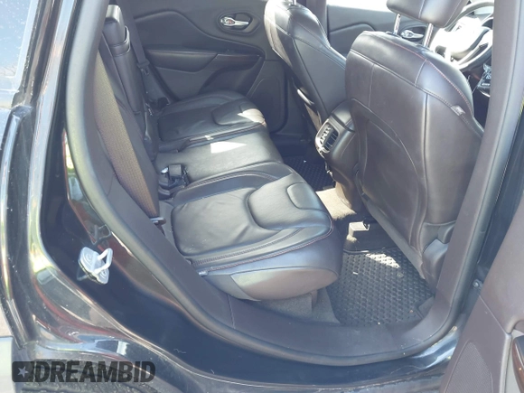 2014 Jeep Cherokee Trailhawk with VIN 1C4PJMBS3EW127749, listed as a IAAI auction lot 41836617 with 207,002 mi miles and . Bid and sale history available at DreamBid. Image 8.