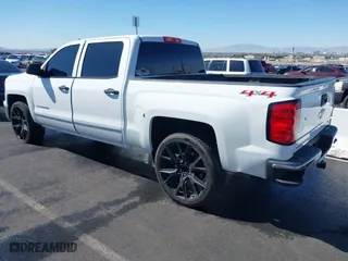 2014 Chevrolet Silverado 1500 LT with VIN 3GCUKRECXEG548397, listed as a IAAI auction lot 41746858 with 215,490 mi miles. Bid and sale history available at carsss.com. Image 3.