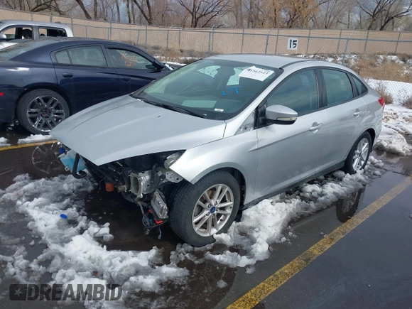 2016 Ford Focus SE with VIN 1FADP3F21GL325603, listed as a IAAI auction lot 41562523 with 97,749 mi miles. Bid and sale history available at carsss.com. Image 2.